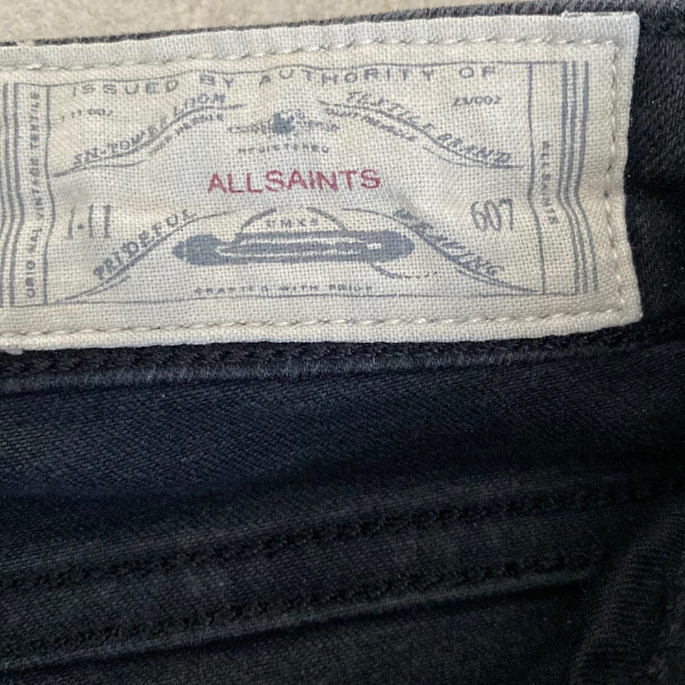 All Saints black denim jeans with cool leather patches on knees.